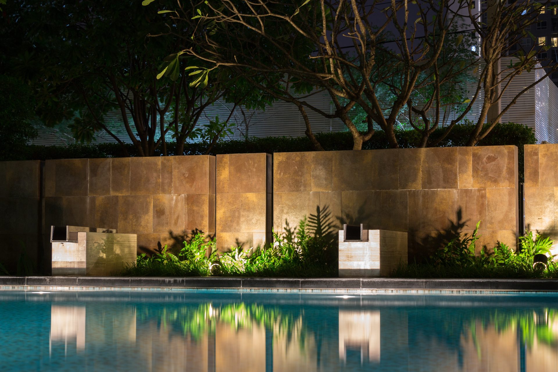 Outdoor speakers integrated into a landscaped patio